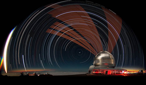 Long-duration fish-eye view of the Gemini North telescope facility showing propagation of the laser guide star.