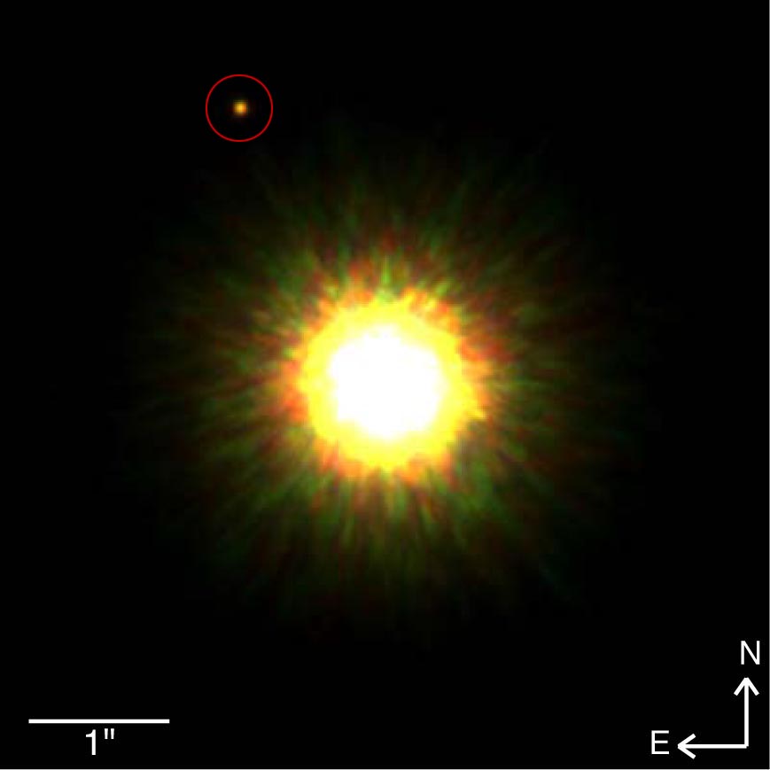 Imagen de óptica adaptativa Gemini de 1RXS J160929.1-210524 y su compañera de ~8 masas de Júpiter (dentro del círculo rojo).