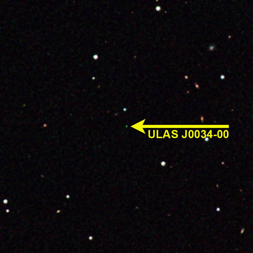 Coolest brown dwarf (arrow) in UKIDSS infrared image, with distant stars.