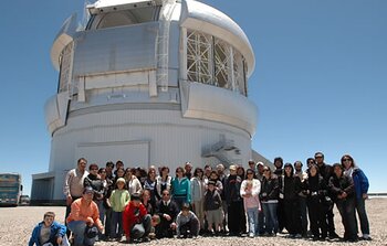 Staff family tour participants outside Gemini South