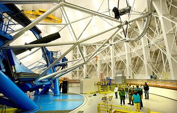 Gemini North staff family tour participants inside the dome