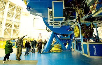 Staff family tour participants visit the telescope
