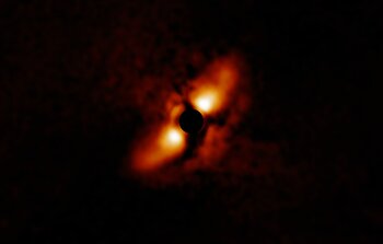 Dusty disk around HD 145718